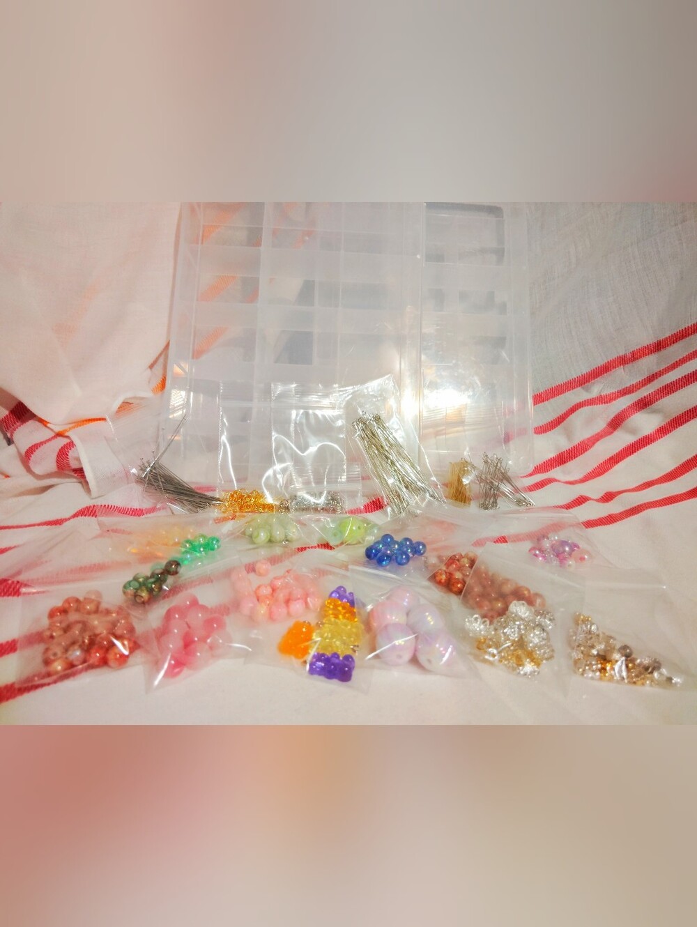 2 big beads Tupperware. Glass Beads. Premium Acrylic Beads. Spacers. Eye Pin.